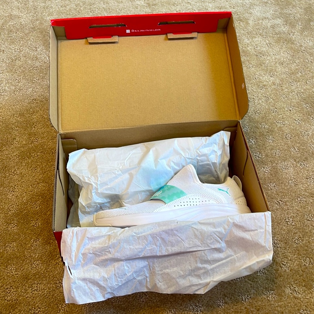White pumas . Size 3 kids. Slide ons. Soft foam.